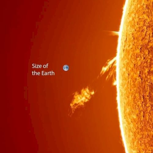 The image shows the Sun's edge with a comparison of Earth's size, highlighting the Sun's massive scale through the Earth's small representation.